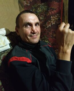 Николай